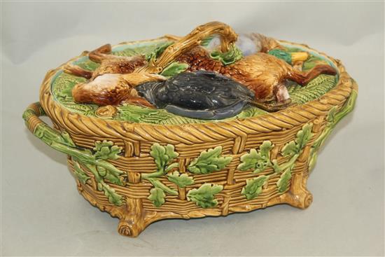 A Minton majolica game pie dish and cover, date code for 1861, 37cm